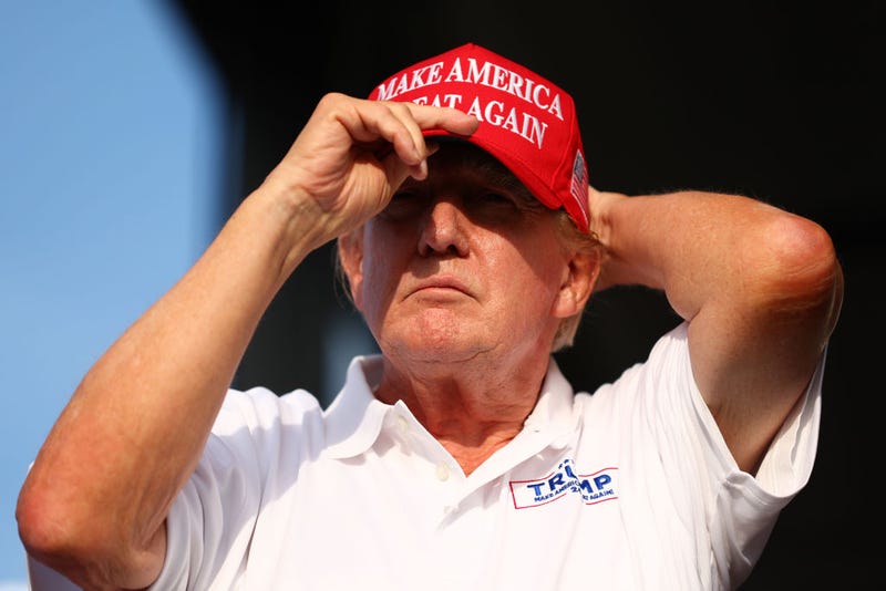 Former U.S. President Donald Trump looks on at the 18th green during day three of the LIV Golf Invitational - Miami at Trump National Doral Miami on April 07, 2024 in Doral, Florida. (Photo by Megan Briggs/Getty Images)