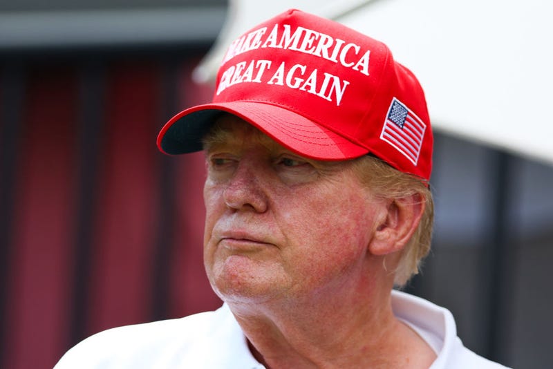 Former U.S. President Donald Trump looks on at the first tee during day three of the LIV Golf Invitational - Miami at Trump National Doral Miami on April 07, 2024 in Doral, Florida.