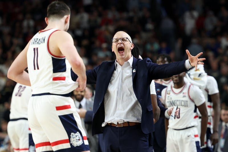 Head coach Dan Hurley and Alex Karaban #11 of the Connecticut Huskies celebrate after beating the Purdue Boilermakers 75-60 to win the NCAA Men's Basketball Tournament National Championship game at State Farm Stadium on April 08, 2024 in Glendale, Arizona.