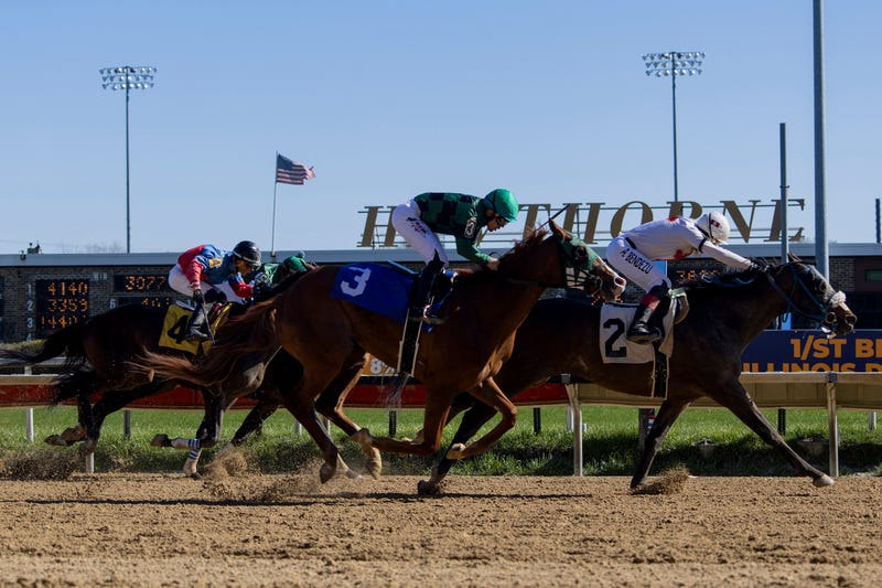 Horses run in the third race of the day on April 6, 2024, at Hawthorne Race Course in Stickney, Ill.