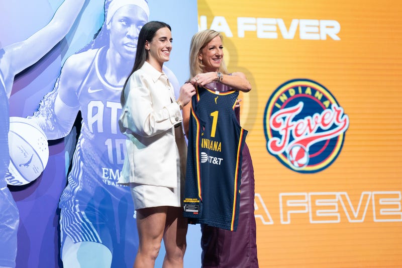 Draftee Caitlin Clark poses for a photo with Cathy Engelbert during the 2024 WNBA Draft on April 14, 2024, at the Brooklyn Academy of Music in Brooklyn, New York.