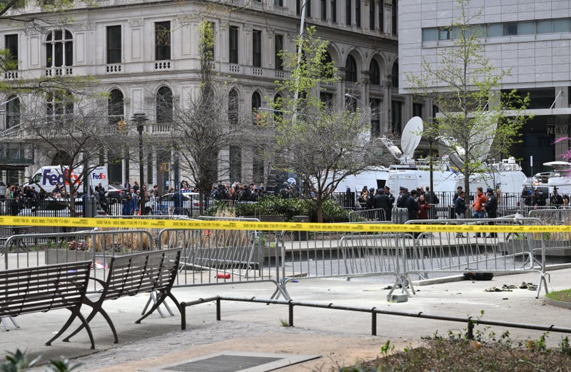 A fire extinguisher is left at the park across from Manhattan Criminal Court  after a man reportedly set himself on fire during the trial of former President Donald Trump, on April 19, 2024.