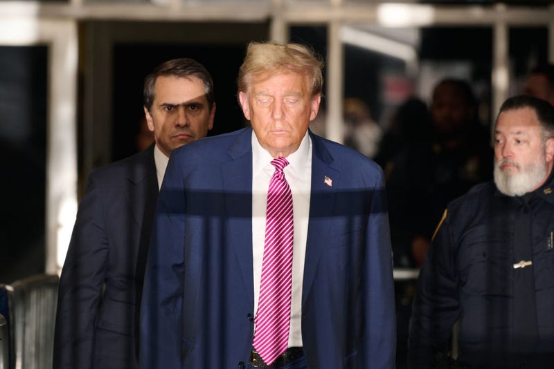 Former U.S. President Donald Trump speaks to the media as he exits the courtroom for the day at Manhattan Criminal Court during his trial for allegedly covering up hush money payments on April 19, 2024 in New York City.