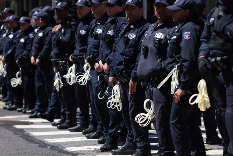 Police officers stand in front of the entrance of Columbia University which is occupied by pro-Palestine protesters in New York on April 22, 2024