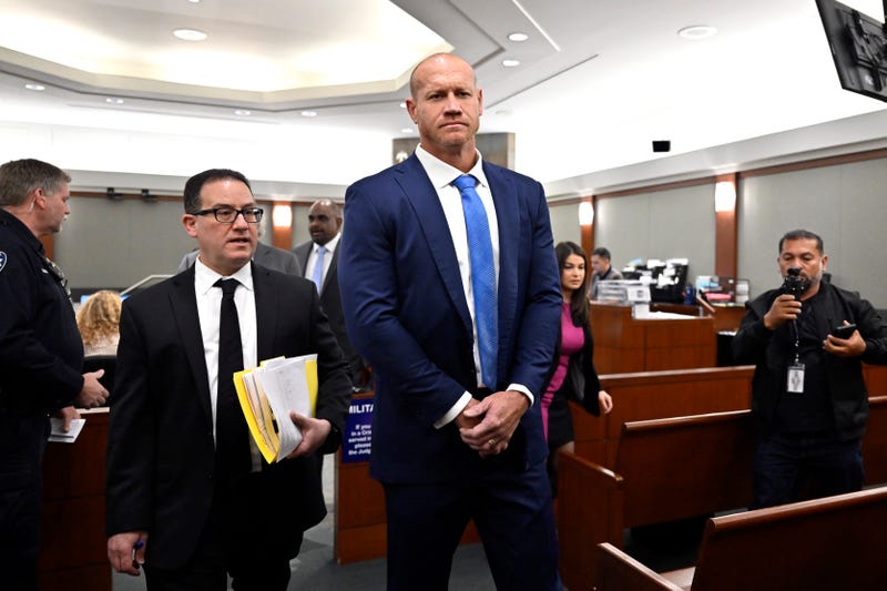 Former Nevada Republican congressional candidate and former professional wrestler Daniel Rodimer (R) walks with his attorney Richard Schonfeld after his initial appearance in Las Vegas Justice Court at the Regional Justice Center on April 10, 2024 in Las Vegas,