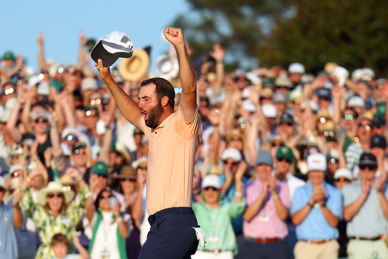 Scottie Scheffler of the United States celebrates on the 18th green after winning the 2024 Masters Tournament at Augusta National Golf Club on April 14, 2024, in Augusta, Ga.