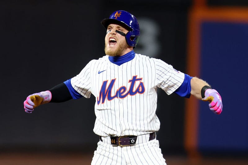 Harrison Bader #44 of the New York Mets celebrates after hitting a a 2-run double to left field in the eighth inning against the Pittsburgh Pirates at Citi Field on April 15, 2024 in New York City. All players are wearing the number 42 in honor of Jackie Robinson Day.
