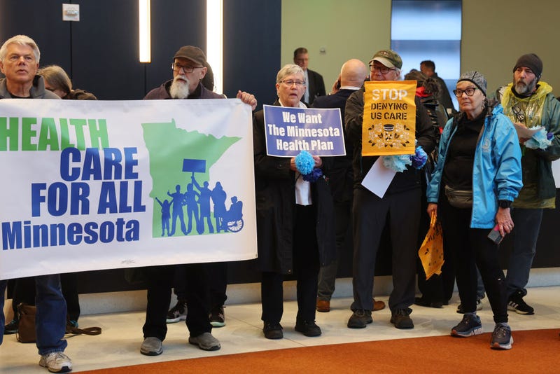 Protesters with People's Action target health insurance giant UnitedHealth Group due to exorbitant health insurance costs and insurance claims denials on April 16, 2024 in Eden Prairie, Minnesota.