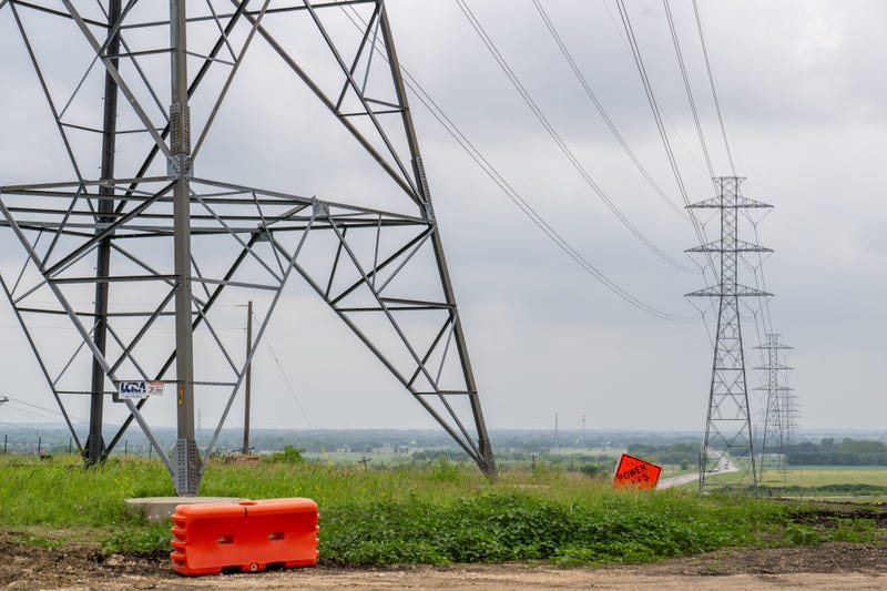 A general view of transmission towers in a field on April 17, 2024, in San Marcos, Texas.