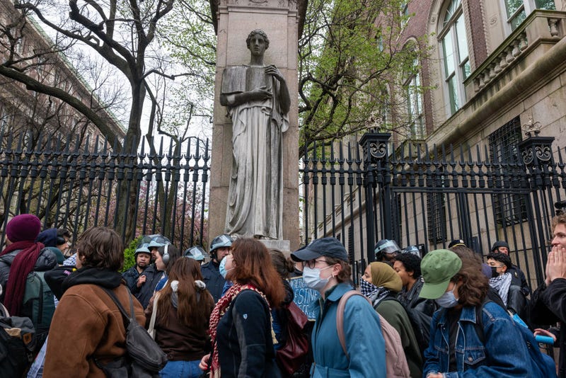 Students and pro-Palestinian activists gather outside of Columbia University to protest the university's stance on Israel on April 18, 2024 in New York City. The protests come after numerous students were arrested earlier in the day after setting up tents on the university lawn in support of Gaza. (Photo by Spencer Platt/Getty Images)