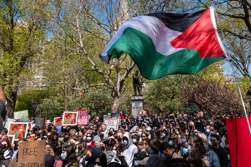 New York University (NYU) students and faculty participate in a protest against Israel's war in Gaza at Washington Square Park on April 23, 2024 in New York City. NYU students have joined a growing number of students at colleges around the country calling for a ceasefire in Gaza and for their schools to divest from Israel.