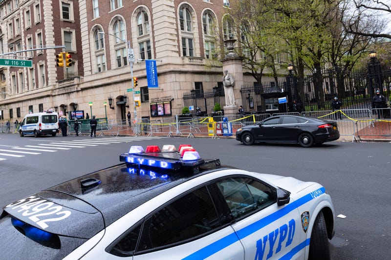 An NYPD squad car is seen parked as NYPD stands guard outside of Columbia University on April 24, 2024