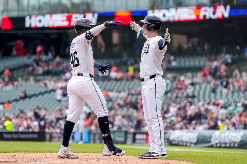 Wenceel Perez and Mark Canha celebrate home run