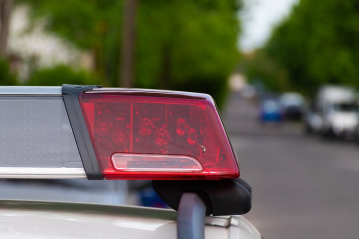 Police siren. 