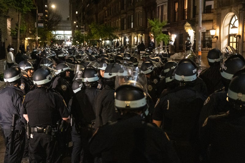 Members of the NYPD prepare to enter Columbia University campus on April 30, 2024