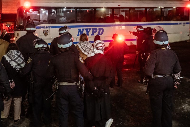 Members of the NYPD detain protesters from the pro-Palestinian protest encampment and Hamilton Hall where demonstrators barricaded themselves inside on April 30, 2024