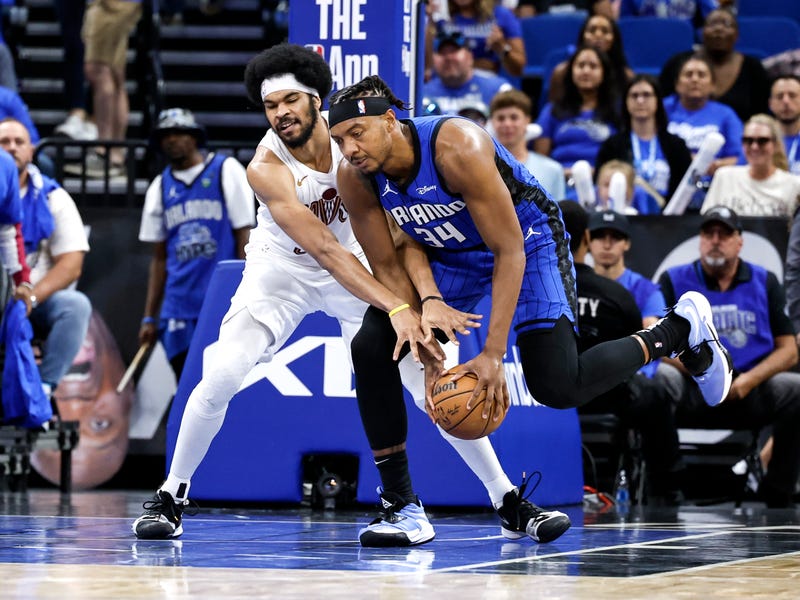 Jarrett Allen #31 of the Cleveland Cavaliers battles for a loose ball with Wendell Carter, Jr. #34 of the Orlando Magic during Game Four of the First Round of the 2024 NBA Eastern Conference Playoffs at the Kia Center on April 27, 2024 in Orlando, Florida. The Magic defeated the Cavaliers 112-89 to tie the series up 2-2.