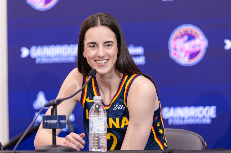 Caitlin Clark #22 of the Indiana Fever talks to reporters during media day activities at Gainbridge Fieldhouse on May 1, 2024 in Indianapolis, Indiana.