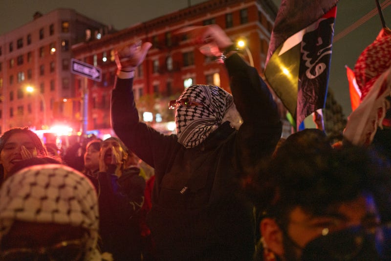 Pro-Palestinian supporters confront police during demonstrations at The City College Of New York (CUNY) on April 30, 2024