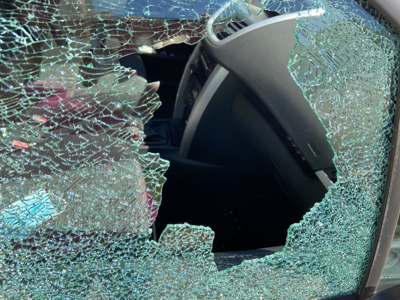 Broken car window following reports of multiple car break ins in Duryea, Pennsylvania