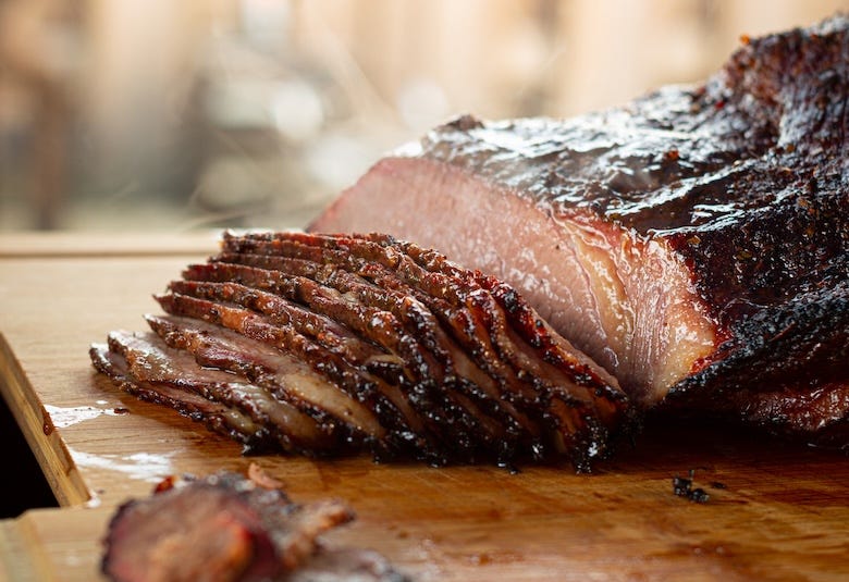 Barbecue brisket on a wooden cutting board