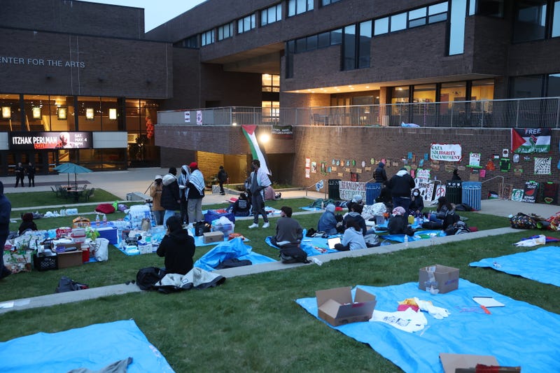 A group of Stony Brook University students protesting the war in Gaza prepare to spend the night outside the Staller Center in an encampment on the Stony Brook campus on April 30, 2024. The encampment was broken up on the night of May 1
