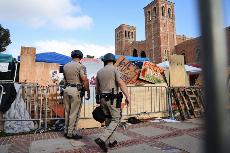 California Highway Patrol (CHP) officers patrol at a pro-Palestinian encampment, the morning after it was attacked by counter-protestors at the University of California, Los Angeles (UCLA) campus, on May 1, 2024 in Los Angeles, California.