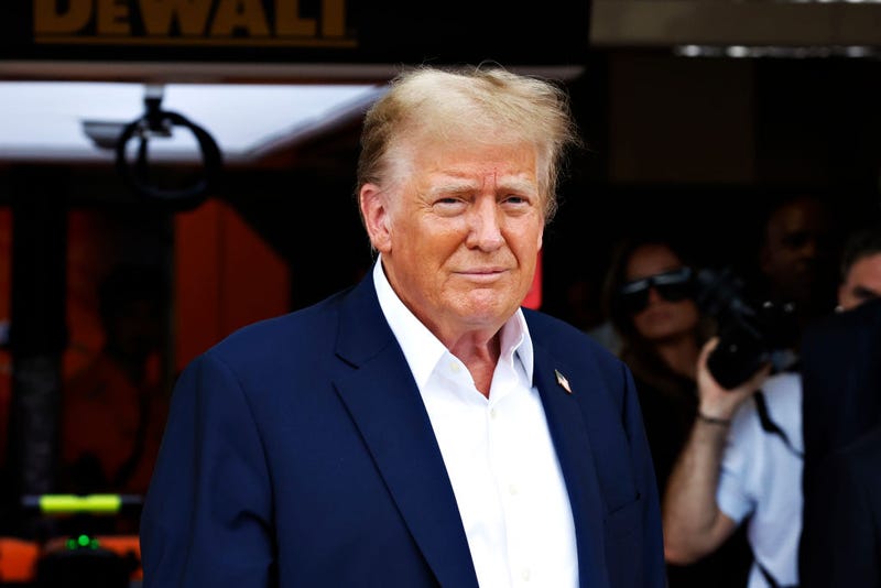 Donald Trump looks on in the Pitlane prior to the F1 Grand Prix of Miami at Miami International Autodrome on May 05, 2024 in Miami, Florida. 