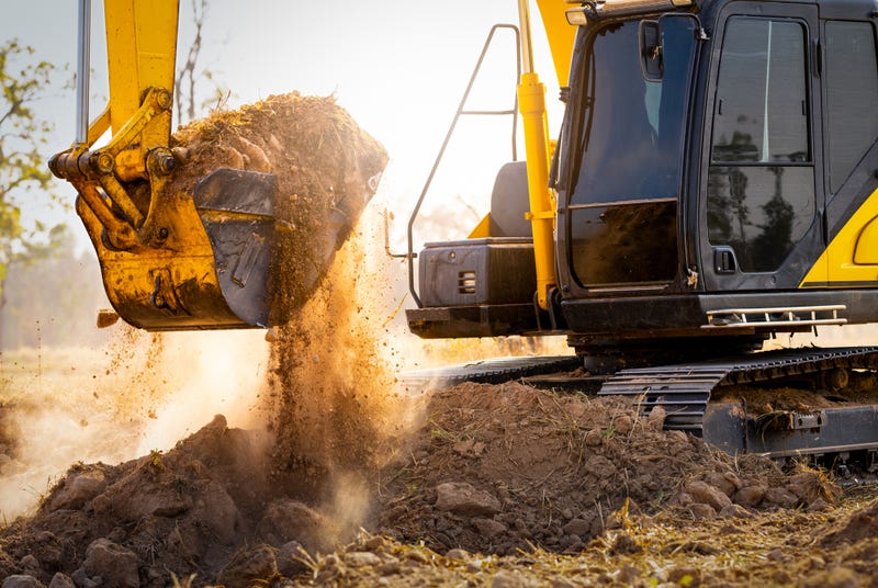Close-up of excavator at construction site.