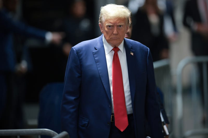 Former U.S. President Donald Trump walks to speak to the press at his trial for allegedly covering up hush money payments at Manhattan Criminal Court on May 6, 2024 in New York City.