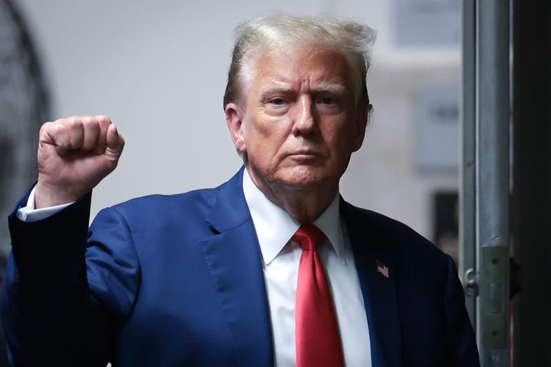 Former U.S. President Donald Trump returns from a break during his trial for allegedly covering up hush money payments at Manhattan Criminal Court on May 6, 2024 in New York City. Trump has been charged with 34 counts of falsifying business records, which prosecutors say was an effort to hide a potential sex scandal, both before and after the 2016 presidential election. Trump is the first former U.S. president to face trial on criminal charges.