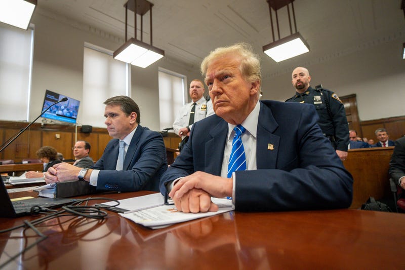 Former U.S. President Donald Trump and attorney Todd Blanche attend his trial for allegedly covering up hush money payments at Manhattan Criminal Court on May 13, 2024 in New York City.