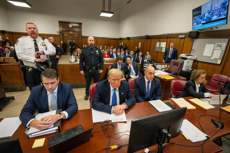 Former U.S. President Donald Trump and attorneys Todd Blanche, Emil Bove and Susan Necheles attend his trial for allegedly covering up hush money payments at Manhattan Criminal Court on May 13, 2024 in New York City.