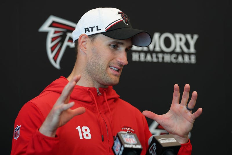 Quarterback Kirk Cousins #18 of the Atlanta Falcons speaks to the media during OTA offseason workouts at the Atlanta Falcons training facility on May 14, 2024 in Flowery Branch, Georgia. 
