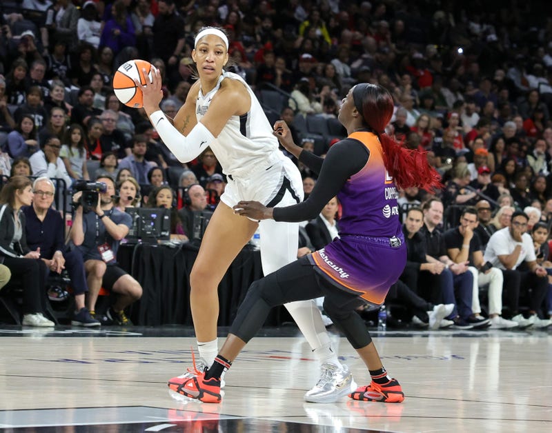 'ja Wilson #22 of the Las Vegas Aces is guarded by Kahleah Copper #2 of the Phoenix Mercury in the second quarter of their game at Michelob ULTRA Arena on May 14, 2024 in Las Vegas, Nevada