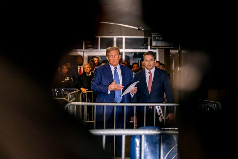 Former U.S. President Donald Trump with attorney Todd Blanche speaks to the media at his trial for allegedly covering up hush money payments at Manhattan Criminal Court on May 20, 2024 in New York City. 