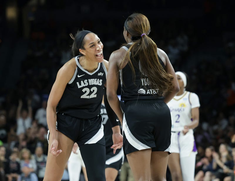 A'ja Wilson #22 of the Las Vegas Aces reacts after her teammate Jackie Young #0 hit a 3-pointer against the Los Angeles Sparks with less than 20 second left in the fourth quarter of their game at Michelob ULTRA Arena on May 18, 2024 in Las Vegas, Nevada.