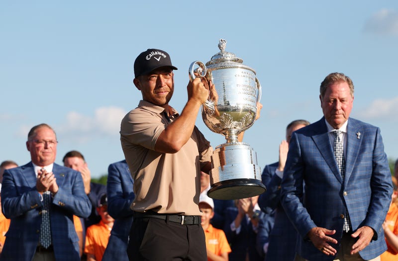 Xander Schauffele of the United States celebrates with the Wanamaker Trophy after winning the 2024 PGA Championship at Valhalla Golf Club on May 19, 2024, in Louisville, Ky.