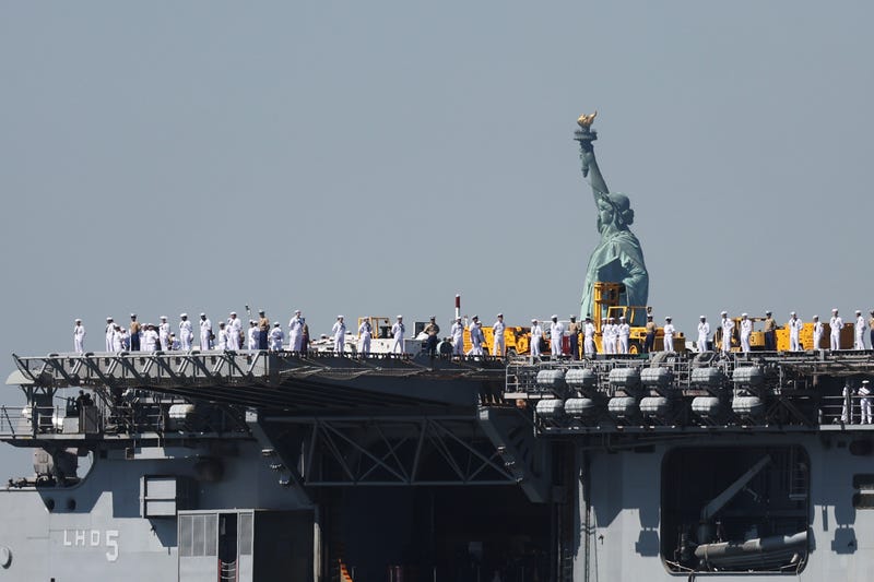 The USS Bataan (LHD-5) sails past the Statue of Liberty as it arrives with the Parade of Ships into New York Harbor during the start of the 36th annual Fleet Week on May 22, 2024 in New York City. The ships travel past the Statue of Liberty and Battery Park in lower Manhattan before ending just below the George Washington Bridge. Fleet Week brings thousands of active service members to New York City for a week of ship tours, concerts, demonstrations and other events that give New Yorkers a close up view of the U.S. military.