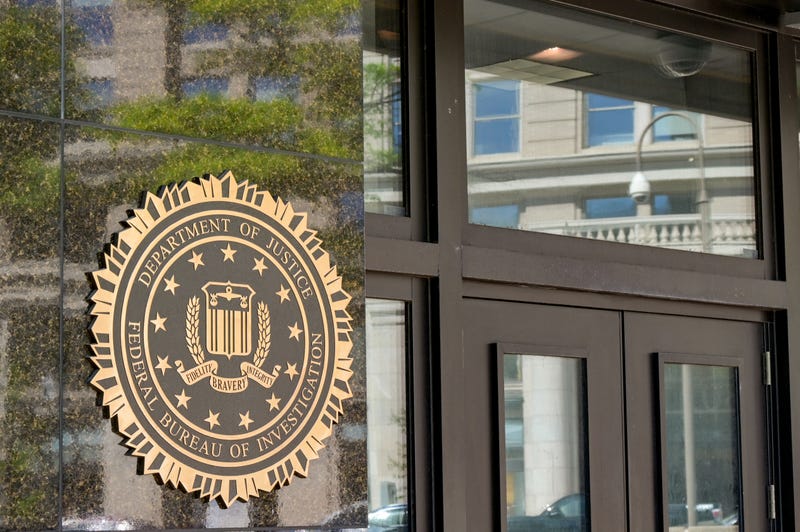An Elizabeth man has been indicted on charges of threatening a local public official and lying to the FBI.