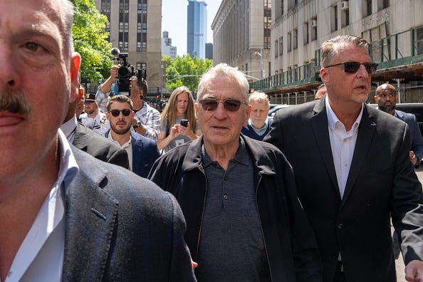 Actor Robert De Niro departs after speaking to the media in front of Manhattan Criminal Court on May 28, 2024 in New York City.