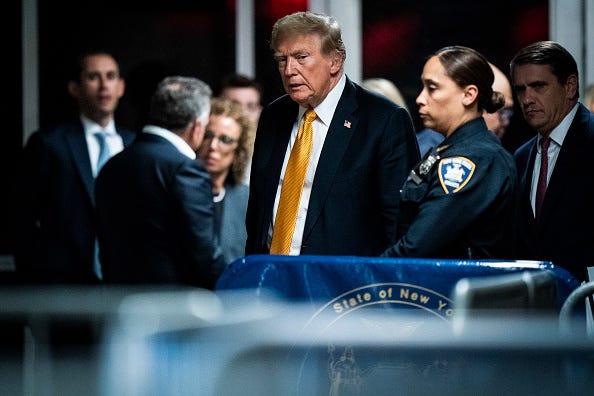 Former U.S. President Donald Trump walks to speak to the media during his criminal trial at Manhattan Criminal Court on May 29, 2024 in New York City.