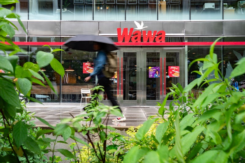 A person walks past a Wawa store on May 29, 2024 in Washington, DC