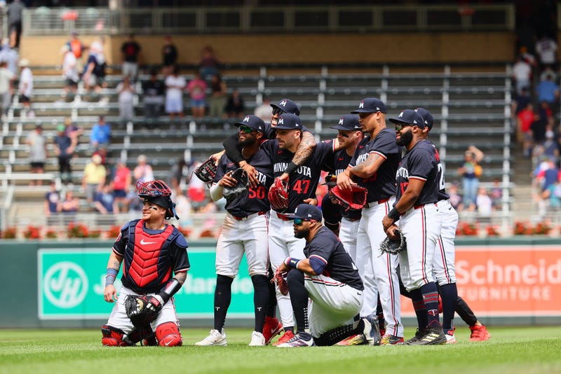 Members of the Minnesota Twins pose for a photo after defeating the Kansas City Royals 7-6 at Target Field on May 30, 2024 in Minneapolis, Minnesota.