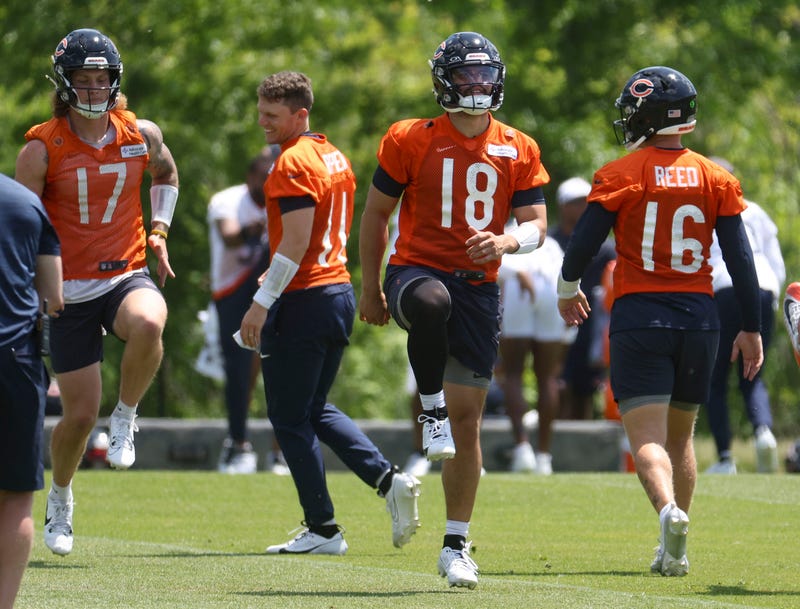 Chicago Bears quarterback Caleb Williams works out with other quarterbacks during OTAs at Halas Hall on May 23, 2024, in Lake Forest, Ill.