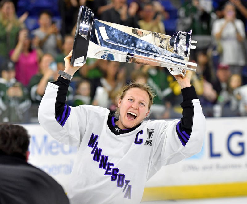 Kendall Coyne Schofield #26 of Minnesota raises the Walter Cup after the win over Boston during Game Five of the PWHL Finals at Tsongas Center on May 29, 2024 in Lowell, Massachusetts. 