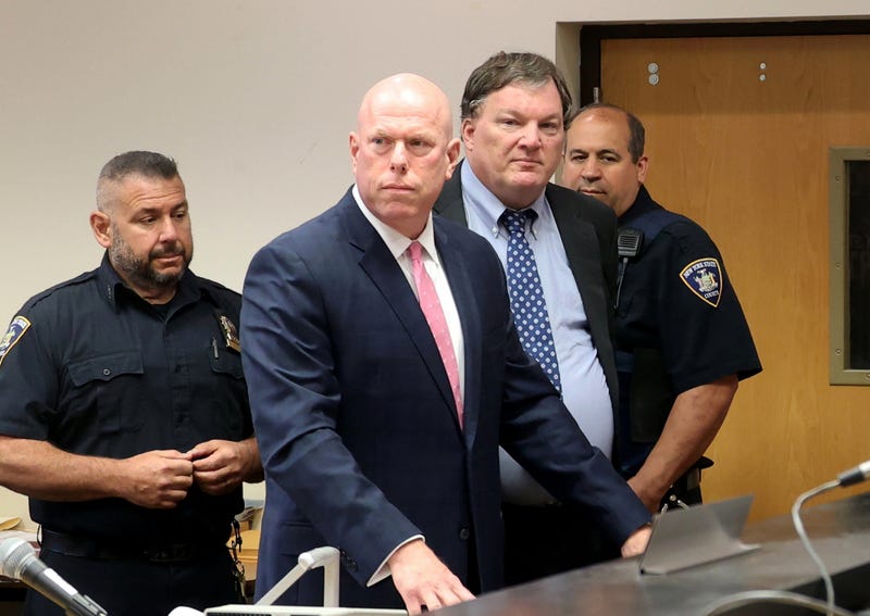 Alleged Gilgo serial killer Rex Heuermann (R) appears with with his attorney Michael J. Brown in Suffolk County court on June 6, 2024 in Riverhead