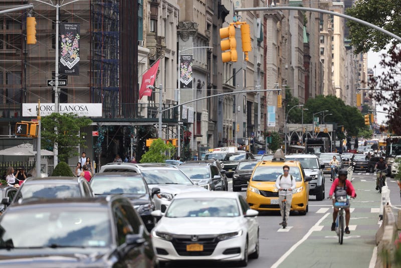 Cars drive along Broadway on June 5, 2024 in NYC.