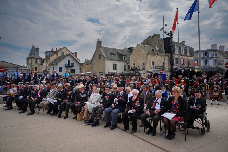 D-Day veterans gather during a parade on June 06, 2024 in Arromanches-les-Bains, France. June 6th is the 80th anniversary of the D-Day landings which saw 156,000 troops from the allied countries launch an audacious attack on the beaches of Normandy.
