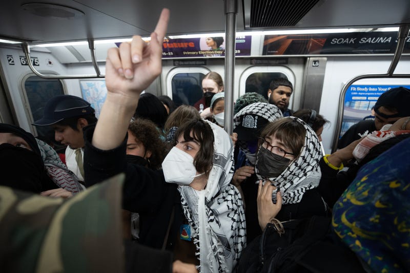 Protesters gather on a subway at Union Square on June 10, 2024 in New York City. 